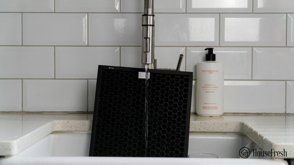 Activated carbon filter being washed